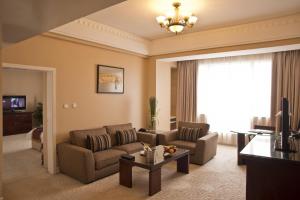 TV a/nebo společenská místnost v ubytování Overseas Chinese Hotel Wenzhou