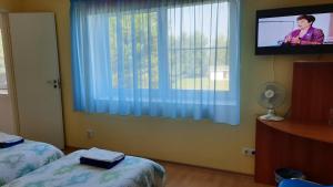 TV tai viihdekeskus majoituspaikassa Willipu Guesthouse