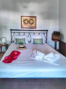 Ένα ή περισσότερα κρεβάτια σε δωμάτιο στο Island Home +16 φωτογραφίες