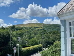 a view of a hill from a house at Northampton House in Llanwrtyd Wells