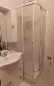 a bathroom with a shower and a sink at Casa Margherita in Deiva Marina