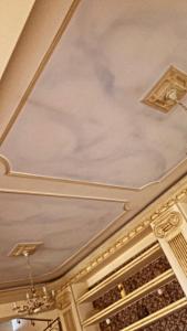 a coffered ceiling with golditures on it at NoVel 1 Luxury apt Katerini in Katerini