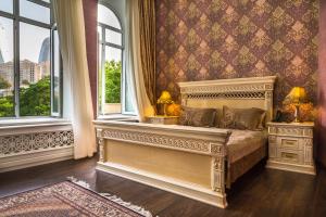 Ένα ή περισσότερα κρεβάτια σε δωμάτιο στο Premier Old Gates Hotel