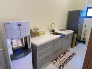 Een keuken of kitchenette bij 悠日 Lazy Days 澎湖民宿