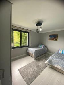 Postel nebo postele na pokoji v ubytování Modern Köy Evi