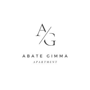 logo portant le titre aante garmaarma dans l'établissement Abate Gimma Apartment, à Bari