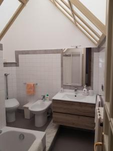 Kúpeľňa v ubytovaní Appartamento Canto + 27 fotografií