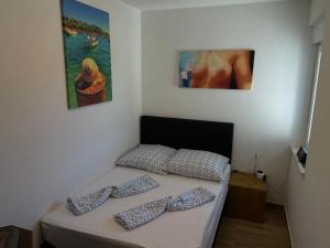 Posteľ alebo postele v izbe v ubytovaní Villa Medulina Xenia + 13 fotografií