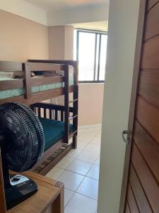 Uma ou mais camas em beliche em um quarto em Maximum Home Flat 904