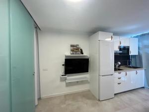 TV a/nebo společenská místnost v ubytování Las Greca