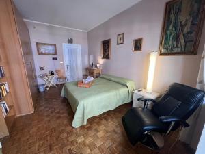 Postel nebo postele na pokoji v ubytování camera Santa Rita