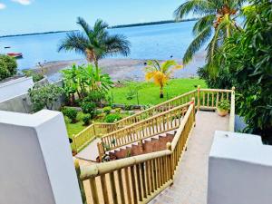 a balcony with a view of the ocean at Lavender in Le Morne