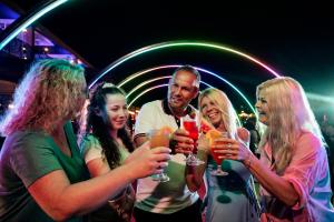 a group of people holding wine glasses at a party at Tui Magic Life Jacaranda in Side