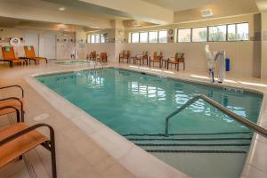 a large swimming pool in a hotel room at Courtyard by Marriott Hagerstown in Hagerstown