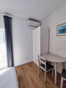 Кровать или кровати в номере Apartmani Seka