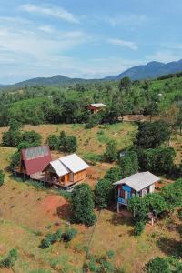 an aerial view of a house in a field at Năm mùa Bungalows in Hương Hóa