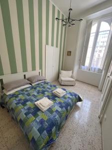 Posteľ alebo postele v izbe v ubytovaní Casa vacanze Eugenia