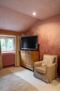 TV a/nebo společenská místnost v ubytování La Chambre Rose