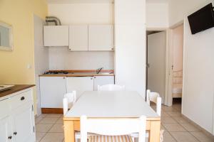Η κουζίνα ή μικρή κουζίνα στο Bungalow Marina di Cortellazzo