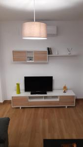 TV a/nebo společenská místnost v ubytování Casa Los García