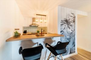 Cuina o zona de cuina de Appartement spacieux avec vue