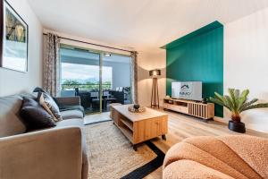Zona d'estar a Appartement spacieux avec vue