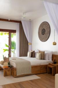 Cama o camas de una habitación en Zanzibar White Sand Luxury Villas & Spa - Relais & Chateaux