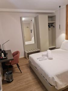 Postel nebo postele na pokoji v ubytování Hotel Miratorre superior