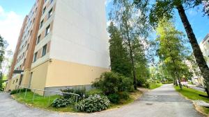 a building on the side of a street at Paradise in Tampere