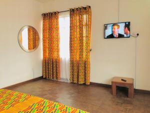 TV o dispositivi per l'intrattenimento presso GRACE LODGE ONITSHA