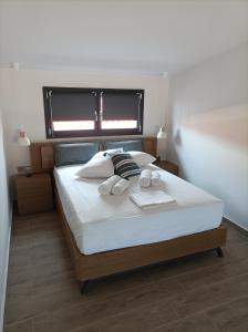 Postel nebo postele na pokoji v ubytování Mulberry Nikiti Resorts