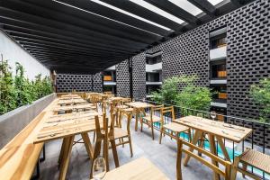 Un restaurante u otro lugar para comer en Hotel Carlota