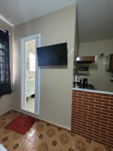 تلفاز و/أو أجهزة ترفيهية في Apartamento em São Lourenço-mg