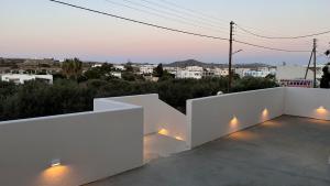 a view from the roof of a house with white walls at Aristotle Suites in Adamas