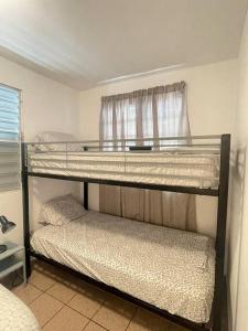 Postel nebo postele na pokoji v ubytování Beach Front Apartments Seven Seas + 25 fotografií