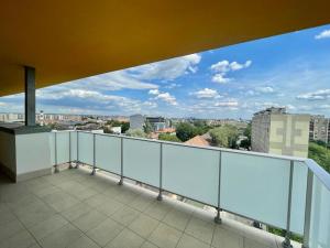 a balcony with a view of a city at Penthouse Design Young #4bedroom #2bathroom #terrace #freeparking in Budapest