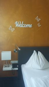 Voodi või voodid majutusasutuse Stadthotel Gürtler toas