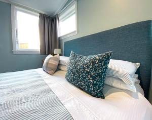 Postel nebo postele na pokoji v ubytování Kauri Villas