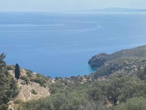 a view of the ocean from a hill at Blue Calm Luxury Villa in Sifnos in Artemonas