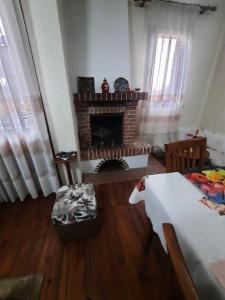 Postel nebo postele na pokoji v ubytování Guesthouse Ndroq