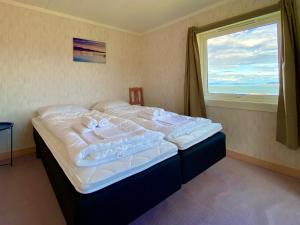 Postel nebo postele na pokoji v ubytování Midnight Sun Paradise Lofoten