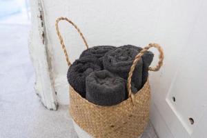 a basket filled with black yarn on a wall at The Blackwater Suite in Colchester