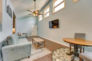 a living room with a couch and a table at Old Forge Studio Close to Lakes and Hiking Trails in Old Forge