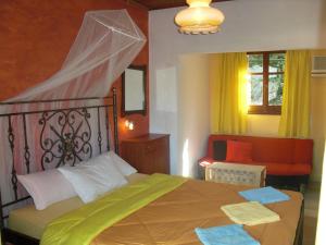Ένα ή περισσότερα κρεβάτια σε δωμάτιο στο Kahlua
