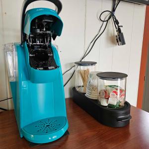 a blue blender sitting on top of a table at CedarWood Inn in Hendersonville