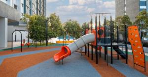 a playground with a slide in a park at La Suite@Alanis Residence in Sepang