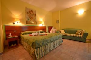 Hotel Parco degli Ulivi客房内的一张或多张床位