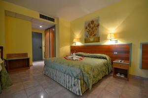 Hotel Parco degli Ulivi客房内的一张或多张床位