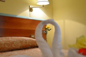Hotel Parco degli Ulivi客房内的一张或多张床位