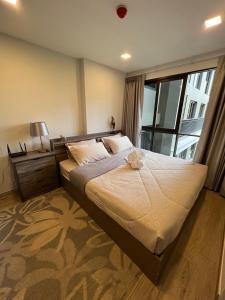 Postel nebo postele na pokoji v ubytování Marvest Condo Hua Hin for rent